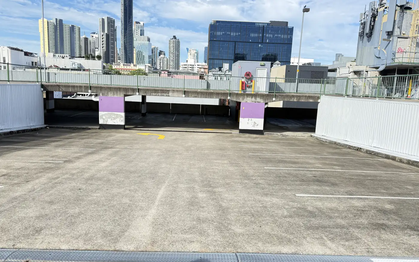 Rooftop parking area photographed during an anonymous property condition review